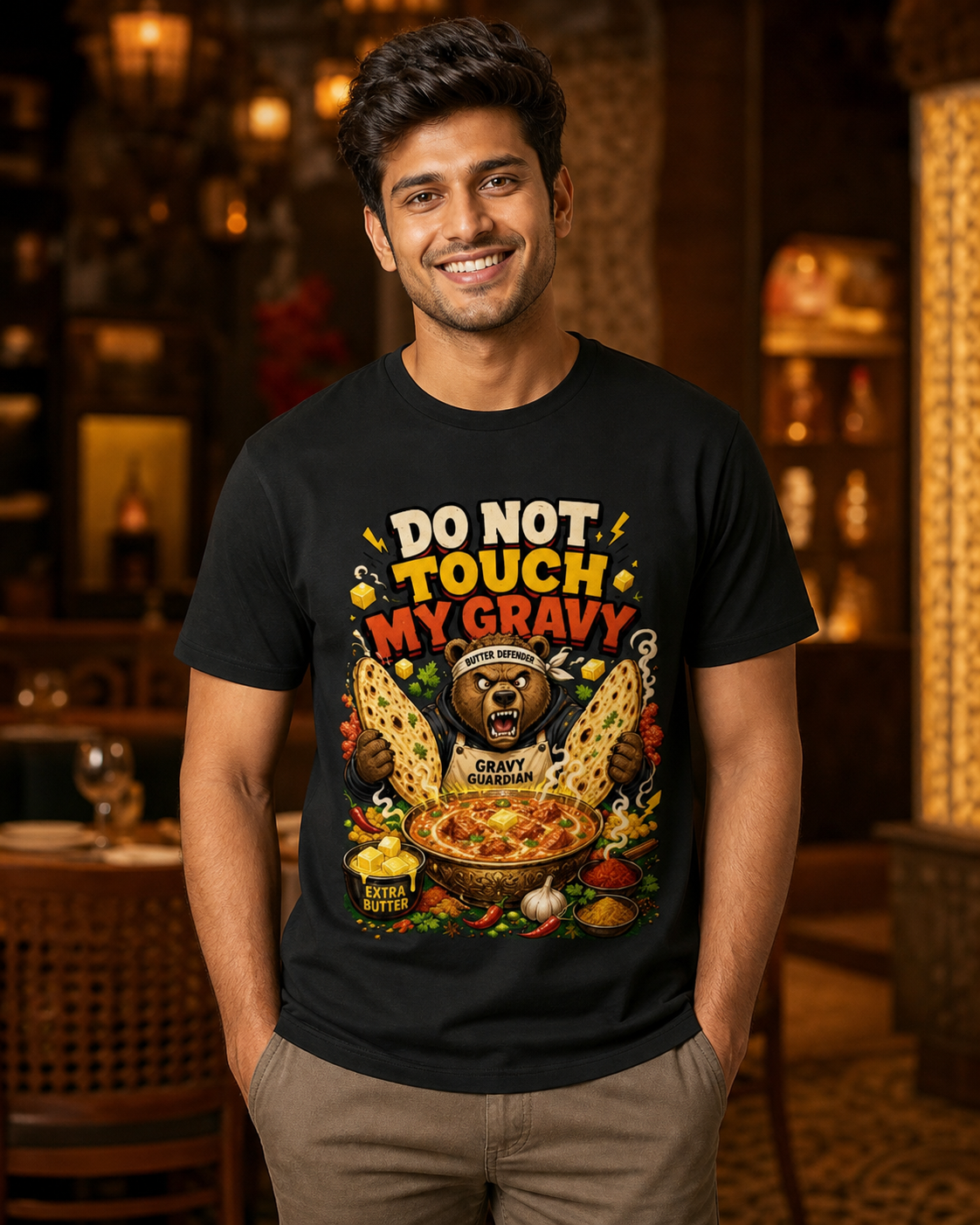 Butter Chicken Bear black Supima T-shirt on male model, approximately 183 cm wearing size L