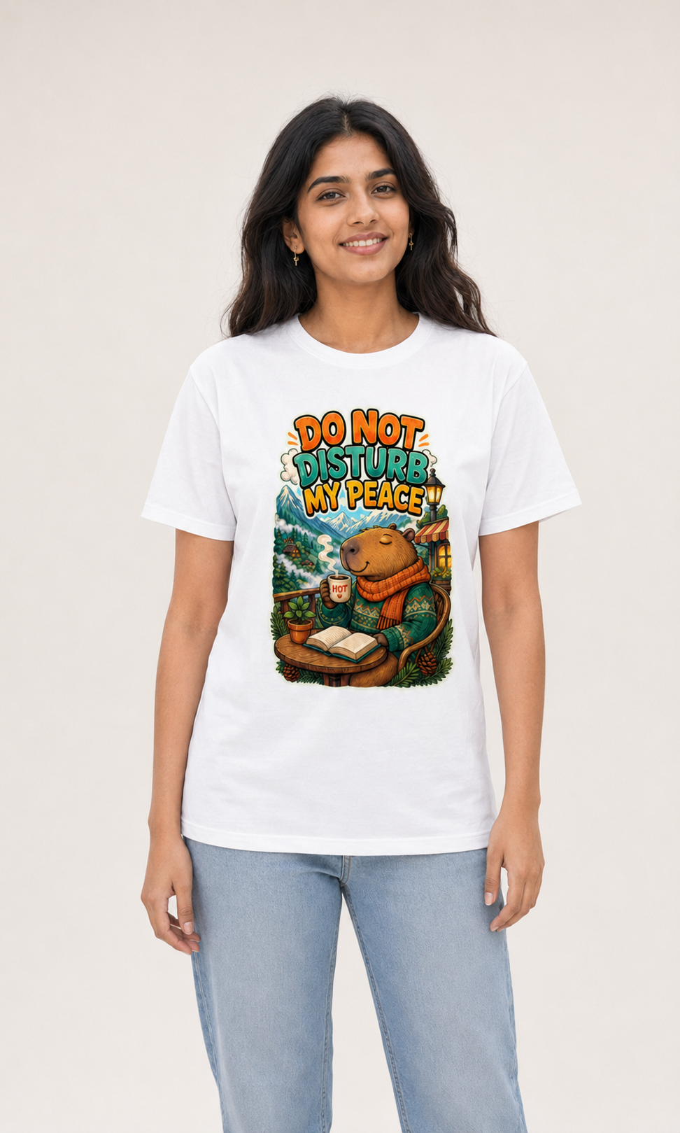 Indian woman wearing the white Cafe Capybara T-shirt in a studio _c_1
