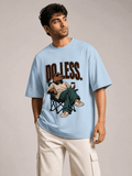 Do Less Capybara baby blue oversized T-shirt on Indian male model, three-quarter studio view