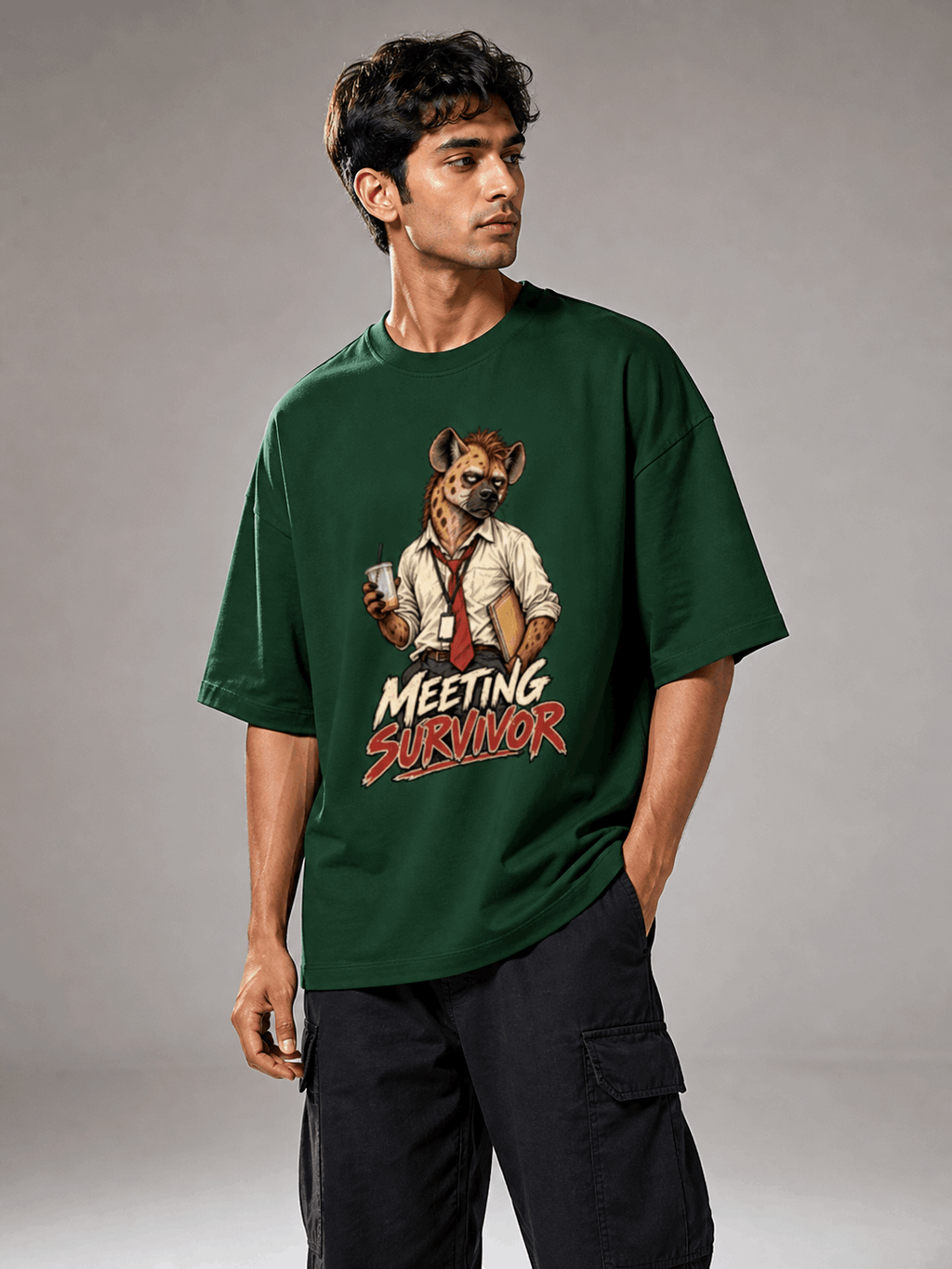 Meeting Survivor Hyena bottle green oversized T-shirt on Indian male model, three-quarter studio view