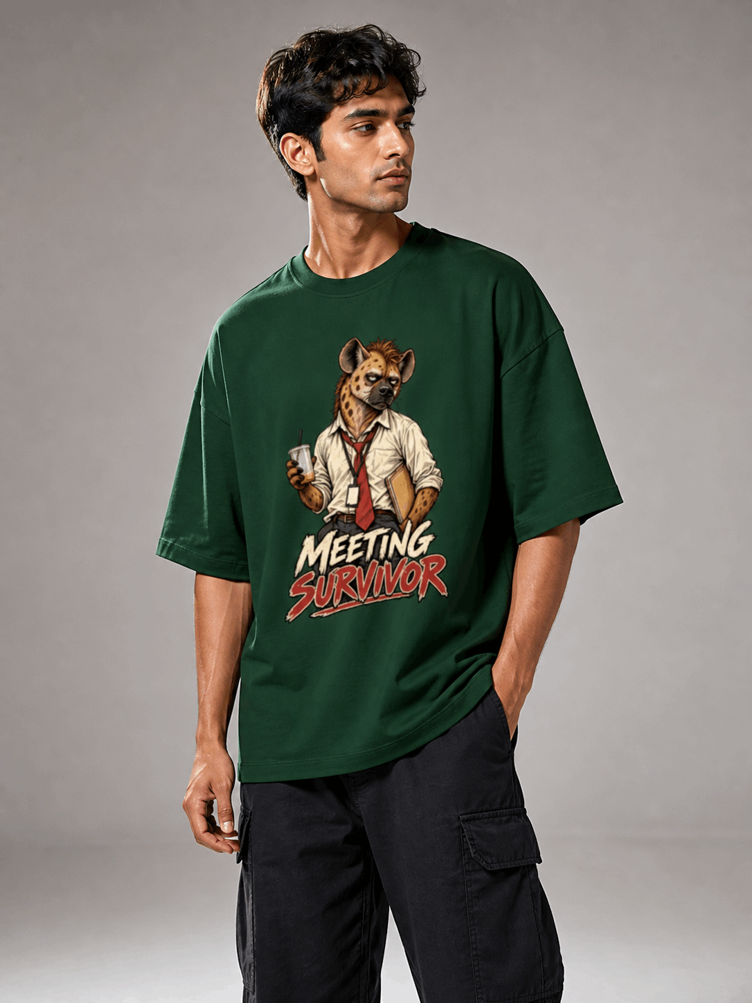 Meeting Survivor Hyena bottle green oversized T-shirt on Indian male model, three-quarter studio view