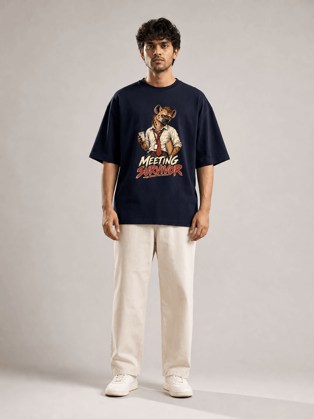 Meeting Survivor Hyena navy blue oversized T-shirt on Indian male model, full-length studio view