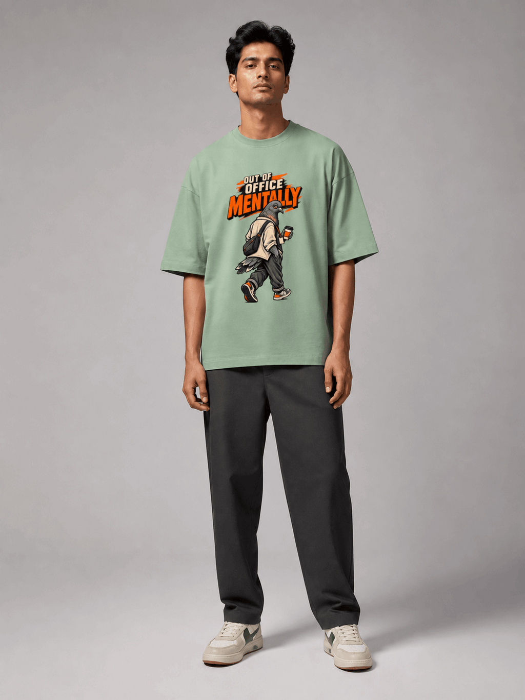Out Of Office Pigeon jade oversized T-shirt on Indian male model, full-length studio view