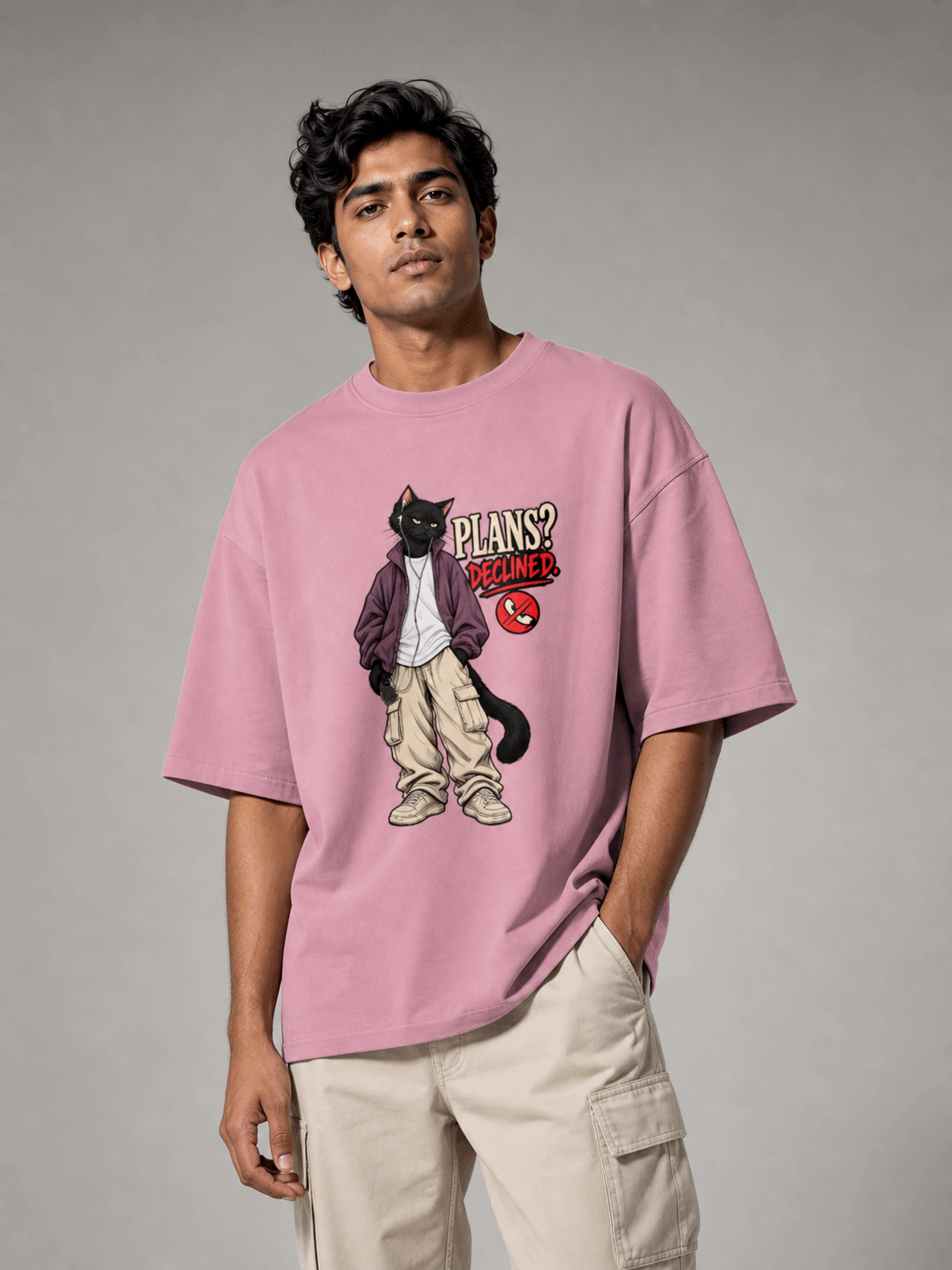 Plans Declined Cat flamingo oversized T-shirt on Indian male model, three-quarter studio view