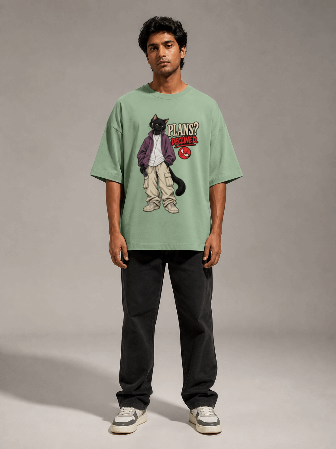 Plans Declined Cat jade oversized T-shirt on Indian male model, full-length studio view