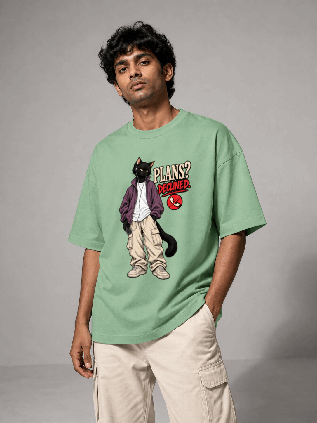 Plans Declined Cat jade oversized T-shirt on Indian male model, three-quarter studio view
