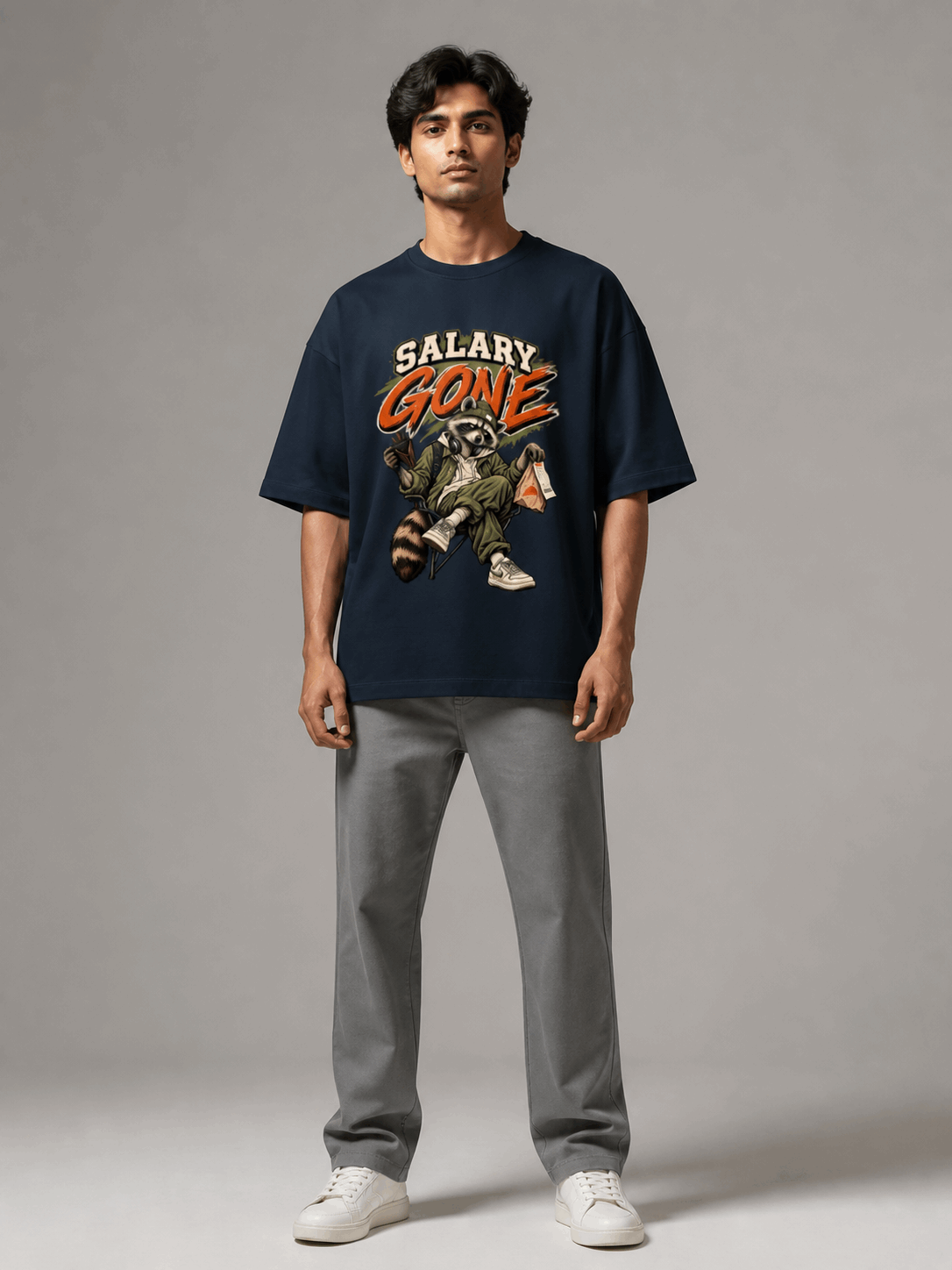 Salary Gone Raccoon navy blue oversized T-shirt on Indian male model, full-length studio view