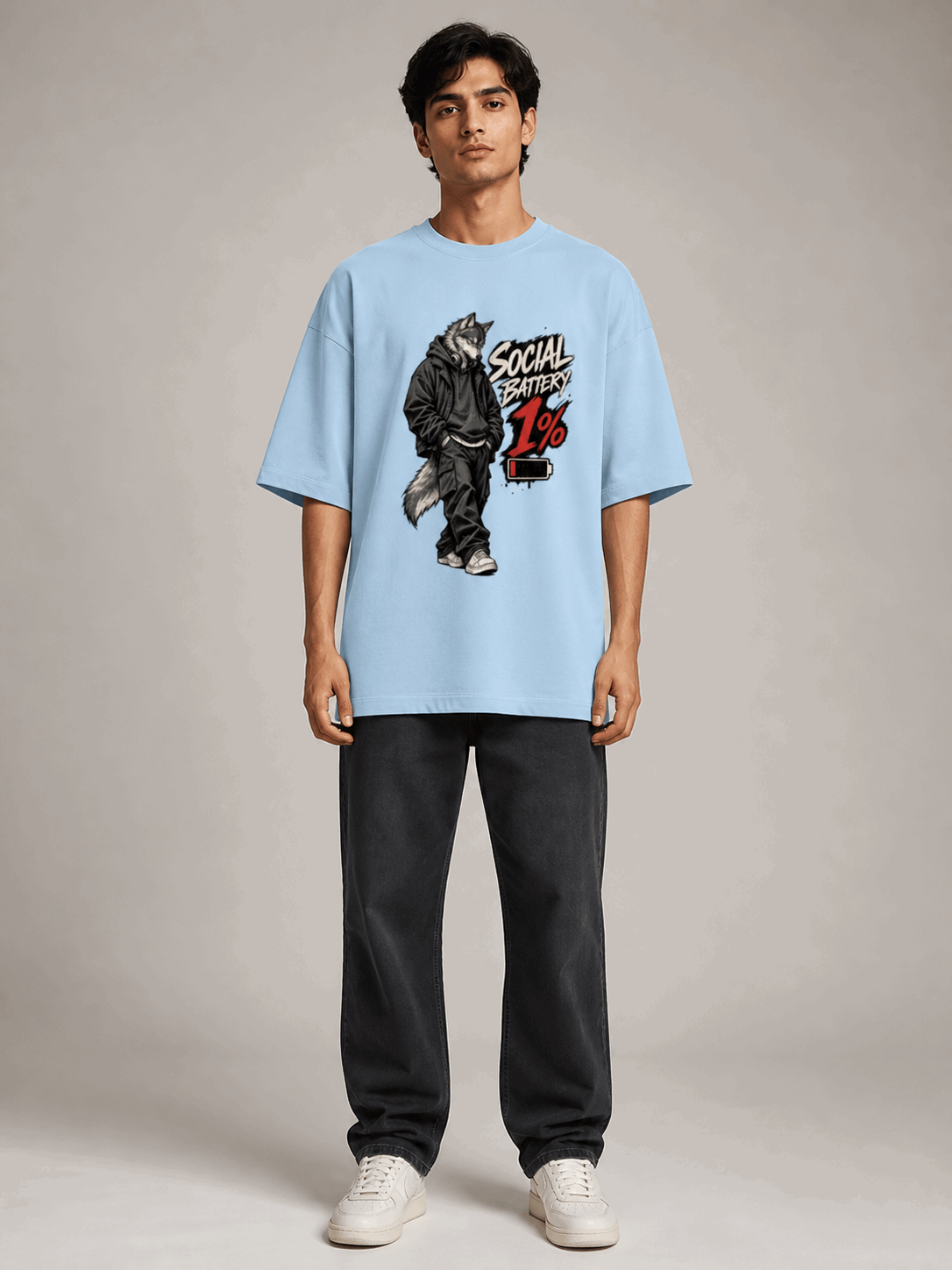 Social Battery Wolf baby blue oversized T-shirt on Indian male model, full-length studio view