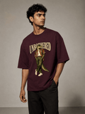 Unbothered Crocodile maroon oversized T-shirt on Indian male model, three-quarter studio view