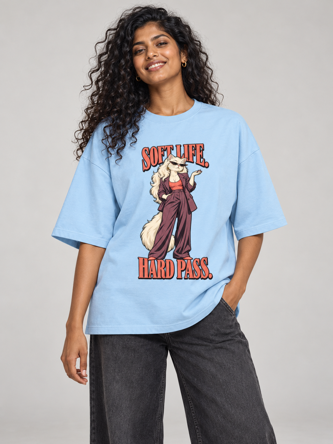 Soft Life, Hard Pass Fox Baby Blue oversized T-shirt on an Indian female model, front studio view