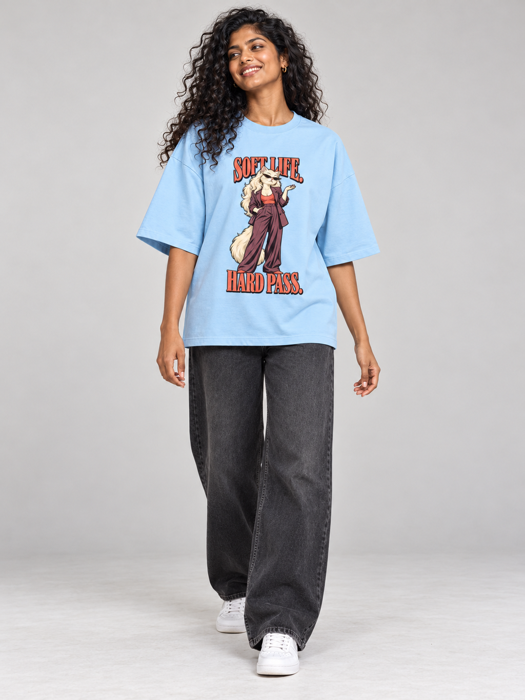 Soft Life, Hard Pass Cat Baby Blue oversized T-shirt on an Indian female model, full-length studio view