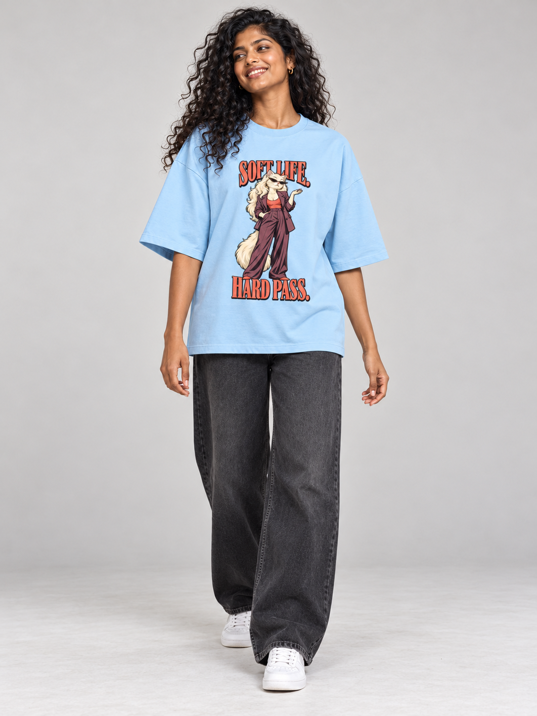 Soft Life, Hard Pass Cat Baby Blue oversized T-shirt on an Indian female model, full-length studio view