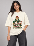 Booked for the Weekend Owl Off White oversized T-shirt on an Indian female model, front studio view