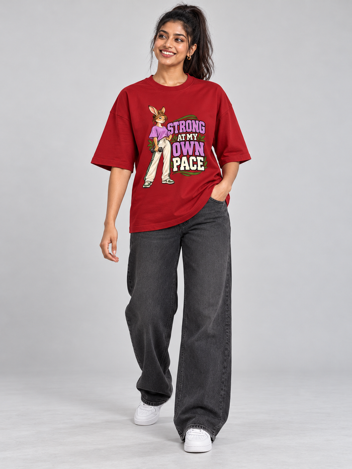 Strong at My Own Pace Hare Red oversized T-shirt on an Indian female model, full-length studio view
